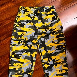 Woman’s camouflage Pants with cinched waist and ankle.